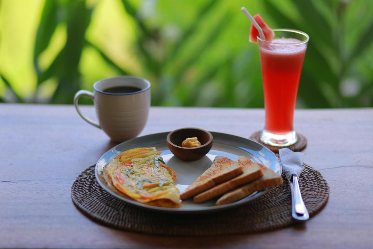 Nirwa Ubud Homestay Bagian luar foto